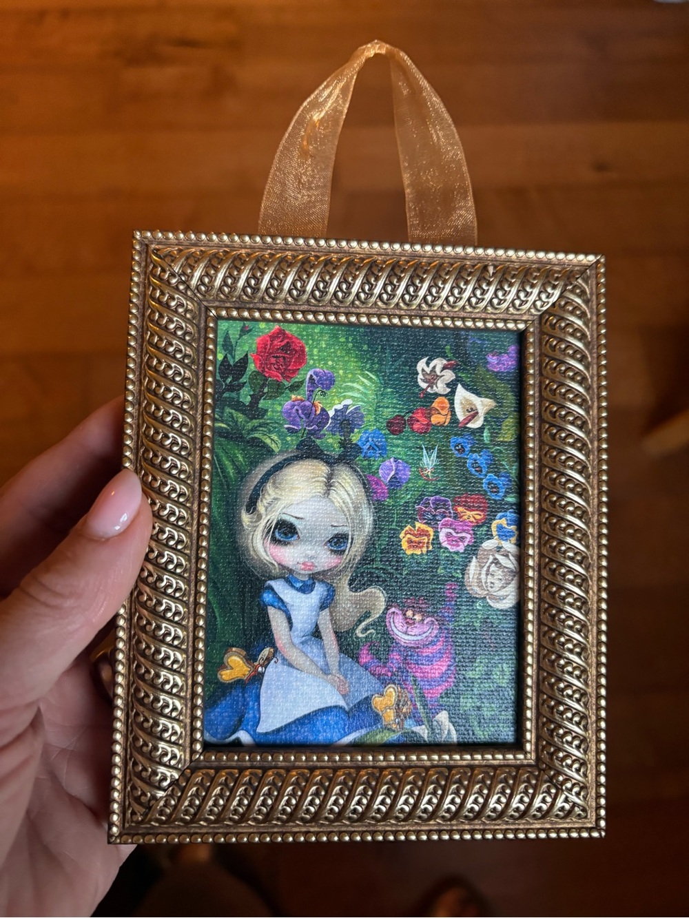Disney Gold Framed Alice Illustration with Green Floral Background